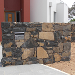 Stone mailbox in Nimitabel basalt